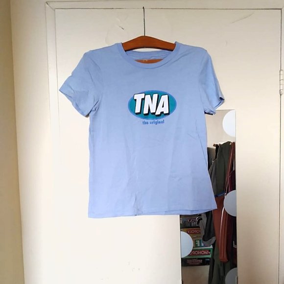 TNA Tops - Aritzia TNA Light Blue Logo Graphic Tee